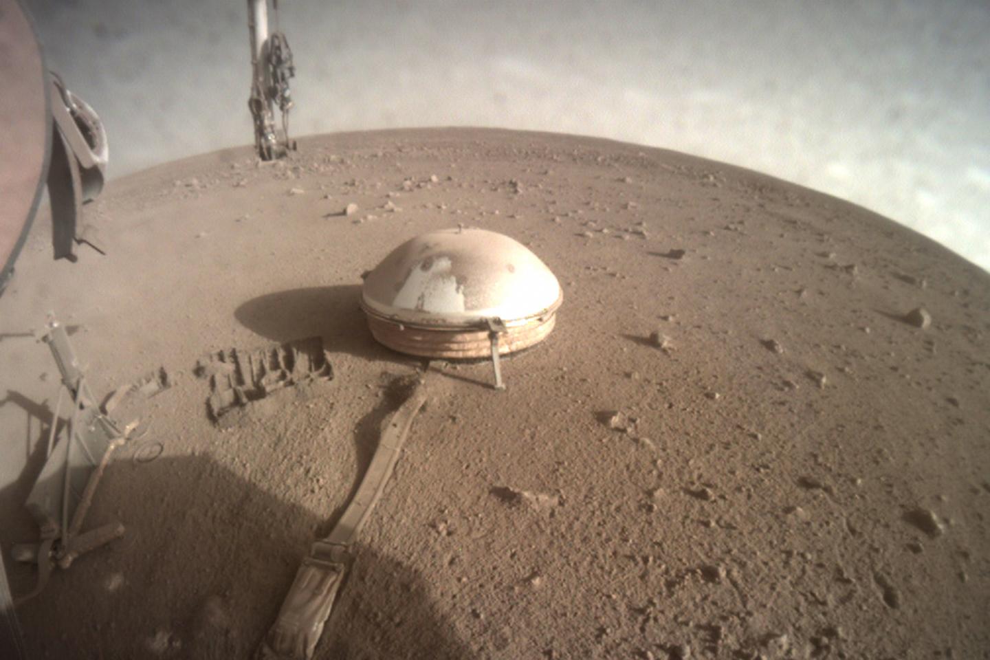 NASA's InSight Mars lander acquired this image of the area in front of the lander using its lander-mounted, Instrument Context Camera (ICC). This image was acquired on July 20, 2021, Sol 941 of the InSight mission.