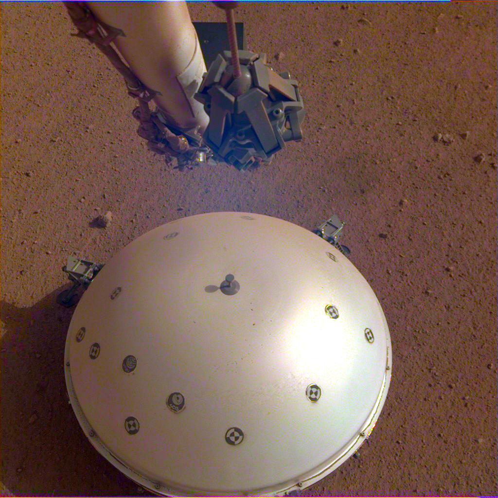 This image shows InSight’s domed Wind and Thermal Shield, which covers its seismometer, called Seismic Experiment for Interior Structure, or SEIS. 