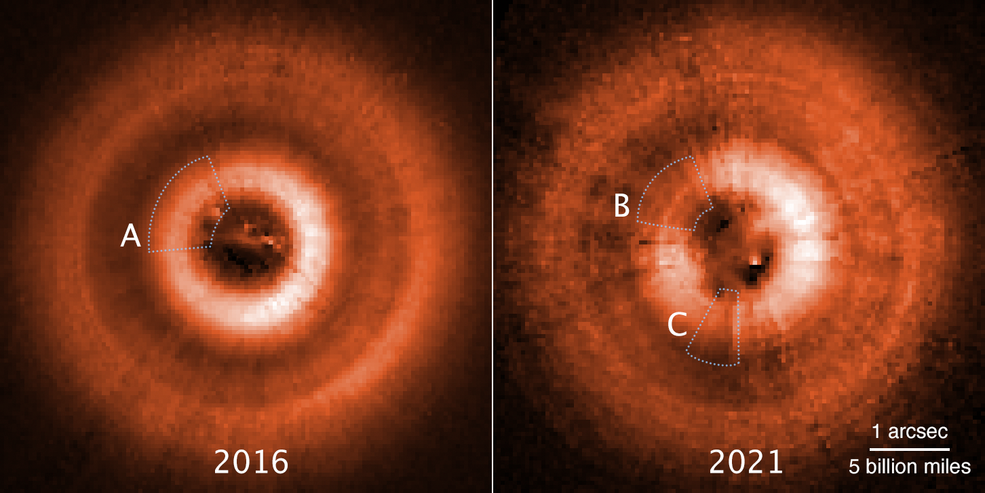 Comparison images from the Hubble Space Telescope, taken several years apart, have uncovered two eerie shadows moving counterclockwise across a gas-and-dust disk encircling the young star TW Hydrae.