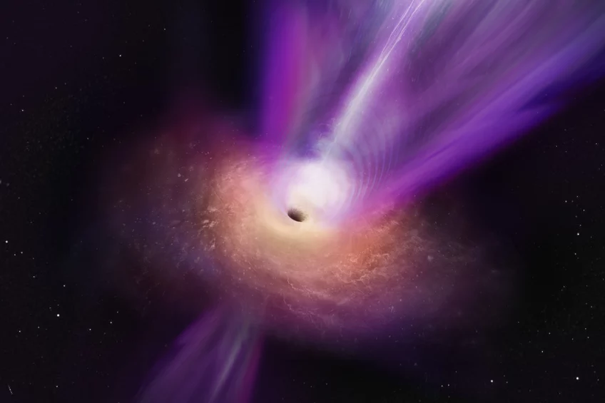 Artist's impression of the centre of an active galaxy like M87. Matter flows along a disk towards the central black hole, while some matter is accelerated along a focused jet.