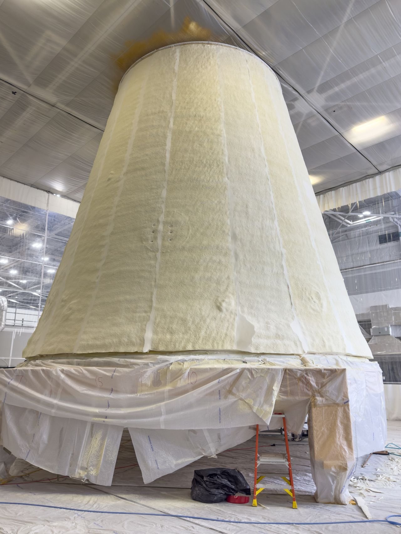 Thermal protection system material applied to the launch vehicle stage adapter (LVSA) of NASA’s SLS (Space Launch System) rocket for Artemis III.