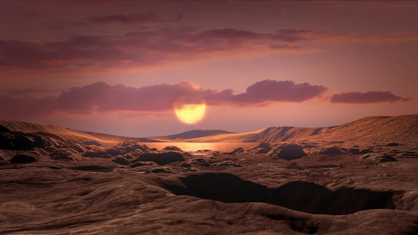 Artist’s conception of a rocky Earth-mass exoplanet like Wolf 1069 b orbiting a red dwarf star. If the planet had retained its atmosphere, chances are high that it would feature liquid water and habitable conditions over a wide area of its dayside. 