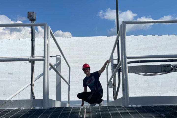 Graduate student Bryan Brzycki at the Green Bank Telescope, where he is using a new scintillation-based technique to vet radio signals potentially coming from extraterrestrial alien civilizations elsewhere in the Milky Way galaxy. 