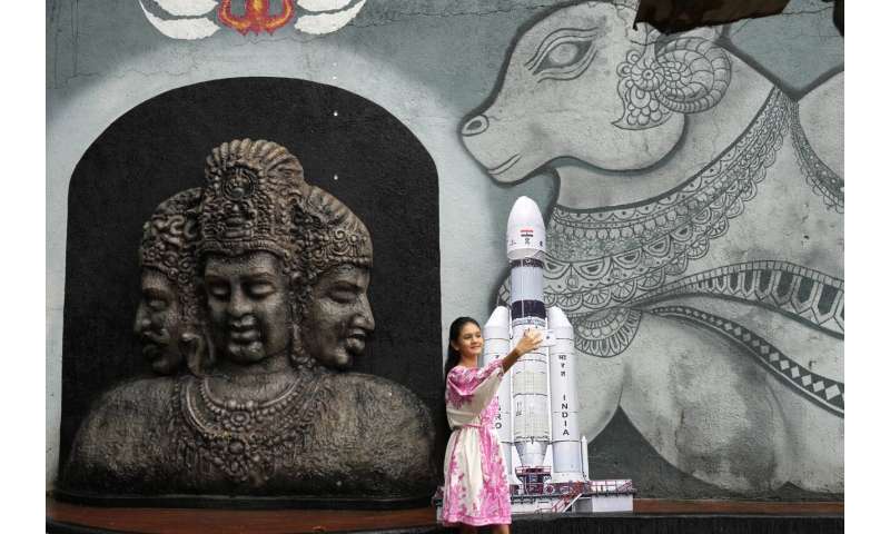 Crowds cheer as India launches a lander and rover to explore the moon’s south pole