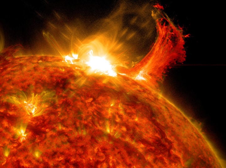 NASA's Solar Dynamics Observatory captured this image of a solar flare on Oct. 2, 2014. The solar flare is the bright flash of light at top.