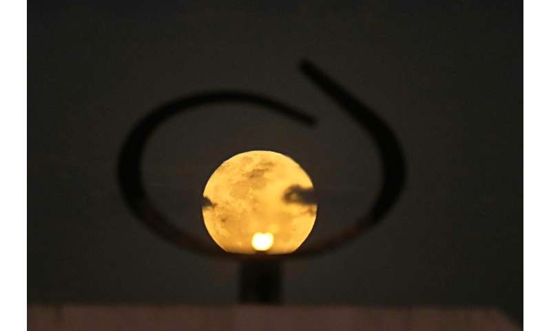 Photos: The first supermoon in August rises around the world