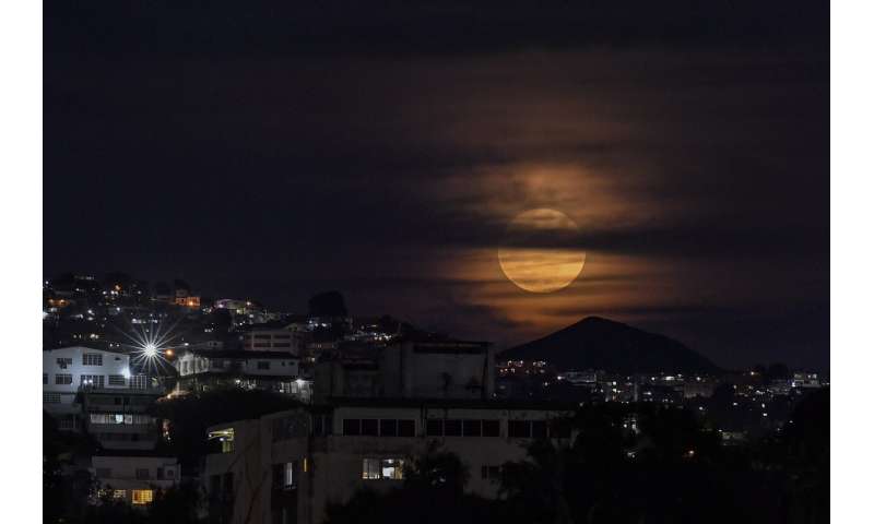 Photos: The first supermoon in August rises around the world