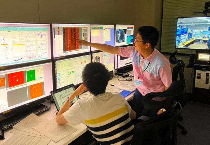 Making observations. Principle investigator Junya Arita and co-investigator, Yoshihiro Takeda making observations in the control room of the National Astronomical Observatory of Japan. 