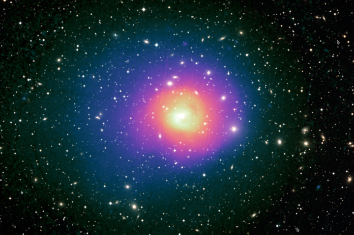 The bright, nearby, and massive Coma galaxy cluster in X-ray (diffuse pink and blue gas – XMM-Newton) and optical (galaxy points – Sloan Digital Sky Survey) light. 