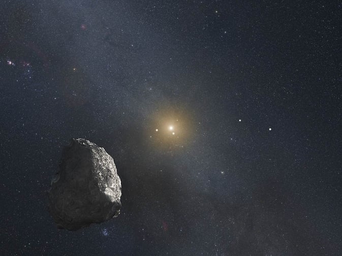 An artist’s impression of a Kuiper Belt object (KBO), located on the outer rim of our solar system at a staggering distance of 4 billion miles from the sun. 