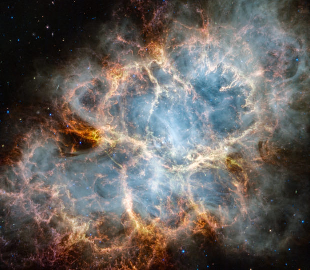 Similar to the Hubble optical wavelength image released in 2005, with Webb the remnant appears to consist of a crisp, cage-like structure of fluffy red-orange filaments of gas that trace doubly ionised sulphur (sulphur III). Within the remnant’s interior, yellow-white and green fluffy ridges form large-scale loop-like structures, which represent areas where dust particles reside. 