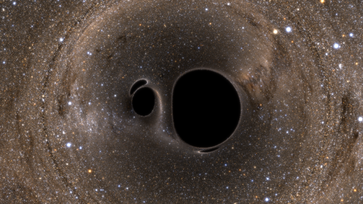 A computer rendering of two black holes that are about to merge, as viewed from above.