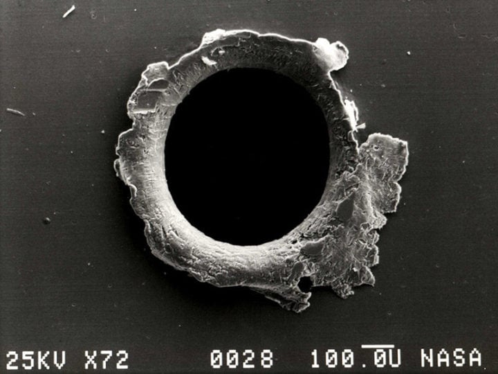 A piece of space junk punched this hole into the hull of NASA’s Solar Max spacecraft. 