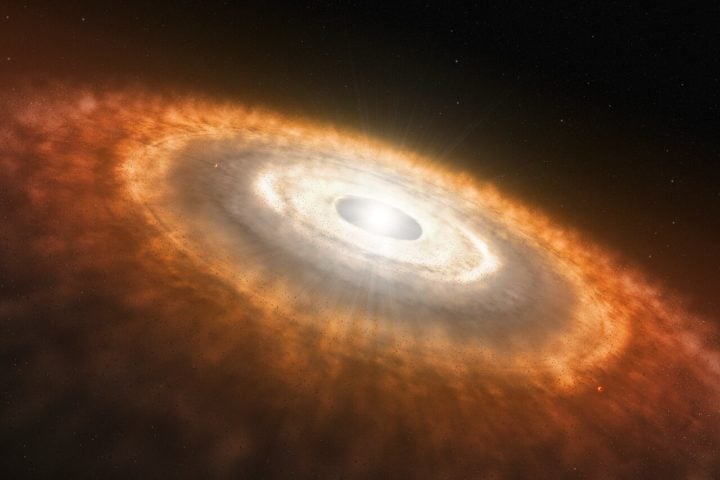 This is an artist’s impression of a young star surrounded by a protoplanetary disc in which planets are forming. 