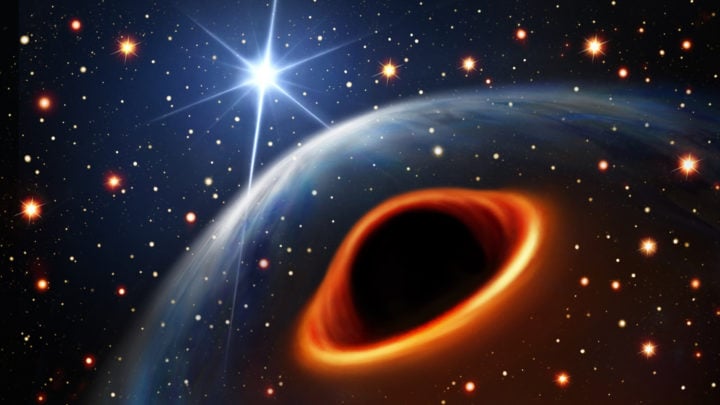 An artist’s impression of the system assuming that the massive companion star is a black hole. The brightest background star is its orbital companion, the radio pulsar PSR J0514-4002E. The two stars are separated by 8 million km and circle each other every 7 days.