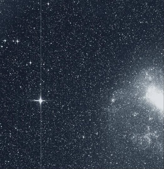 In August, the TESS telescope took this snapshot of the Large Magellanic Cloud (right) and the bright star R Doradus (left). 