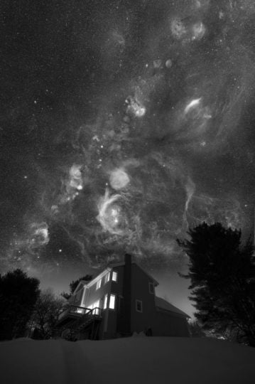 A composite image of what the night sky would look like if our eyes had deep H-alpha vision, taken from team member Dennis di Cicco’s house in Massachusetts.