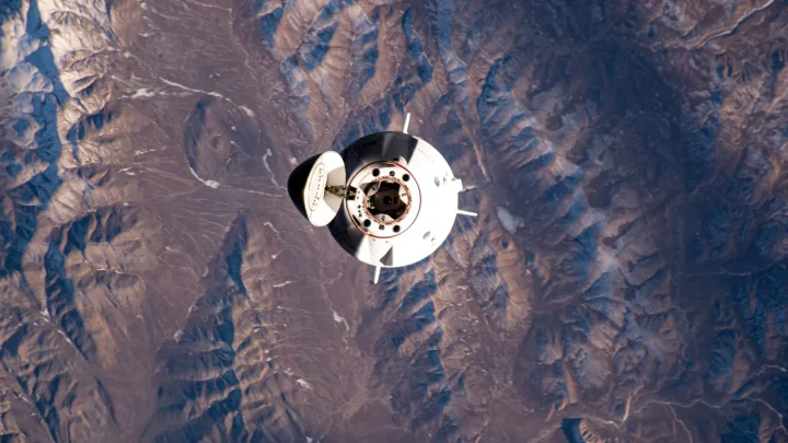 The SpaceX Dragon Freedom spacecraft carrying the four-member Axiom Mission 3 (Ax-3) crew is pictured approaching the International Space Station 260 miles above China north of the Himalayas.