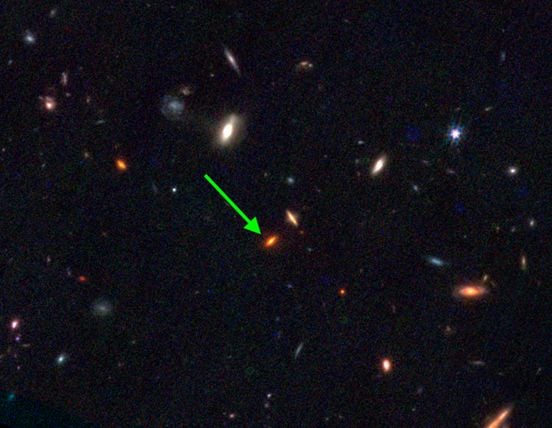 JWST-7329: a rare massive galaxy that formed very early in the Universe. This JWST NIRCAM image shows a red disk galaxy but with images alone it is hard to distinguish from other objects. Spectral analysis of its light with JWST revealed its anomalous nature – it formed around 13 billions years ago even though it contains ~4x more mass in stars than our Milky Way does today.