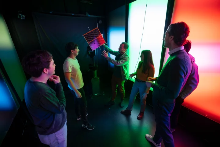 Researchers from the Stanford Center for AEroSpace Autonomy Research (CAESAR) in the robotic testbed, which can simulate the movements of autonomous spacecraft.