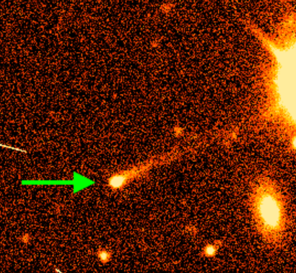 This image shows asteroid 2015 VA108, one of the active asteroids spotted by volunteers from the Active Asteroids Citizen Science project. The object, indicated by the green arrow, orbits entirely within the Asteroid Belt between Mars and Jupiter, but sports a tail like a comet. 