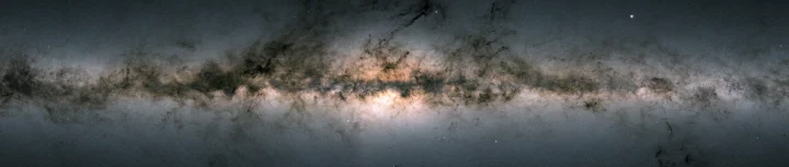 The plane of our Milky Way galaxy, as seen by ESA’s Gaia space mission. It contains more than a billion stars, along with darker, dusty regions Gaia couldn’t see through. With its greater sensitivity and longer wavelength coverage, NASA’s Nancy Grace Roman Space Telescope’s galactic plane survey will peer through more of the dust and reveal far more stars.