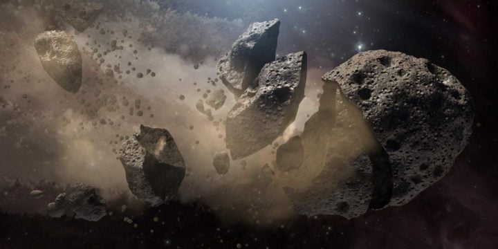 An asteroid is breaking up, producing a lot of dust, which reaches the Earth eventually.