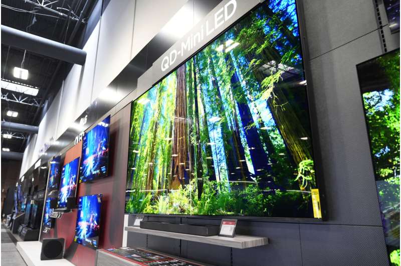 A TV as big as a bed? With the holidays approaching, stores stock more supersize sets