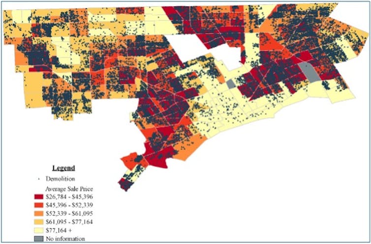 A cluster of tiny triangles, representing demolitions, are focused in red and orange slices of Detroit. Red sections had an average sale price between $26,784 to $45,396. A shade of red slightly lighter was $45,396 to $52,339.