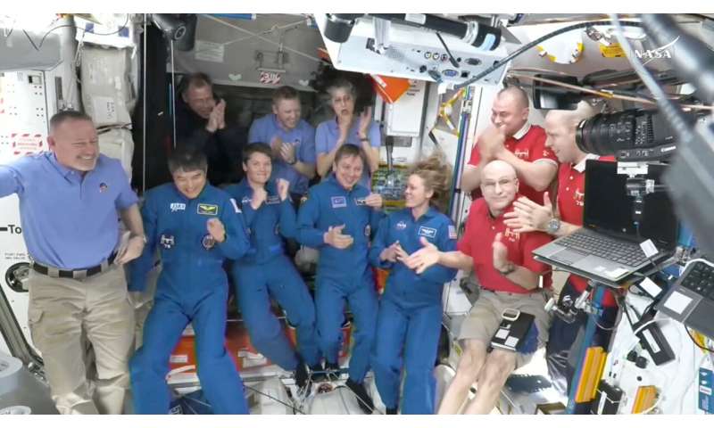 NASA's stuck astronauts welcome their newly arrived replacements to the space station