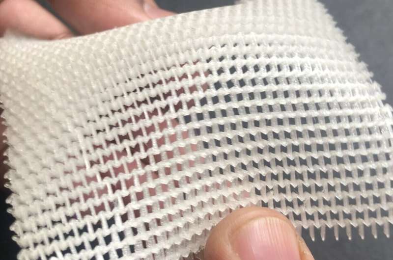 Image showing the flexibility of the 3D-printed auxetic structure. Credit: Heriot-Watt University Textile engineer develops 3D-printed material to boost mobility in protective clothing