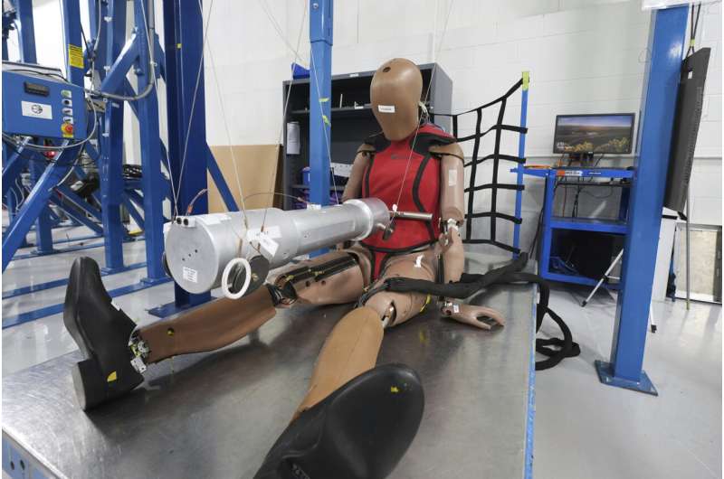 A THOR-5F female crash test dummy is shown on an impact rig at Humanetics in Farmington Hills, Mich., Tuesday, June 10, 2025. Credit: AP Photo/Paul Sancya Crash dummies used in car safety tests are still modeled after men despite higher risks for women