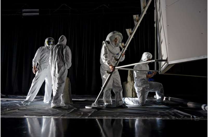 The Flat Floor Facility is an air-bearing floor, providing full-scale simulation capabilities for lunar surface systems by simulating zero gravity in two dimensions. Wearing low-fidelity materials, test engineers can understand how the extreme lighting of the Moon’s South Pole could affect surface operations during Artemis III. Credit: NASA/Charles Beason NASA Engineers Simulate Lunar Lighting for Artemis III Moon Landing - NASA