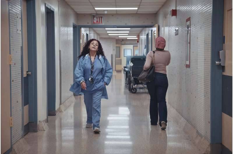Medical staff walk through a hallway at Brookdale University Hospital and Medical Center on Tuesday, July 1, 2025, in the Brooklyn borough of New York. Credit: AP Photo/Andres Kudacki Foreign medical residents fill critical positions at US hospitals, but are running into visa issues