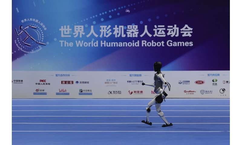 Photos of Beijing's World Humanoid Robot Games show how a human touch is still needed