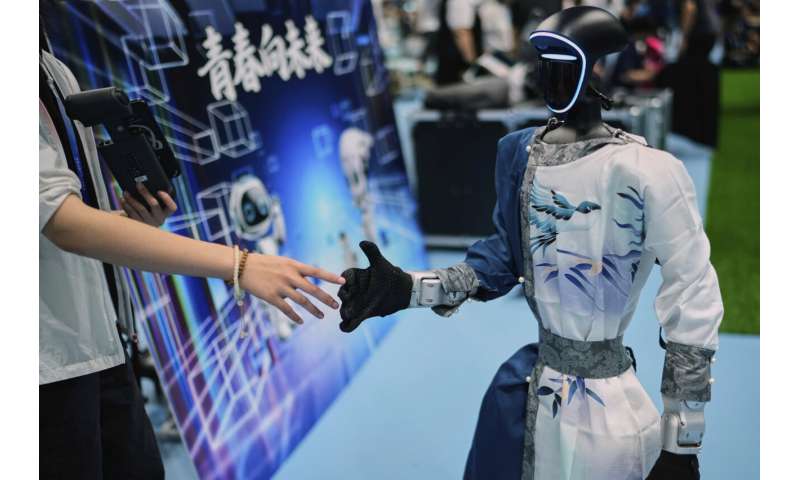Photos of Beijing's World Humanoid Robot Games show how a human touch is still needed