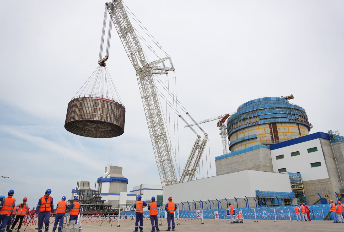 A large crane is lifting the CB20 module of the nuclear island of Unit 3 at the Haiyang Nuclear Power Plant in Yantai, Shandong Province, China on August 4, 2025