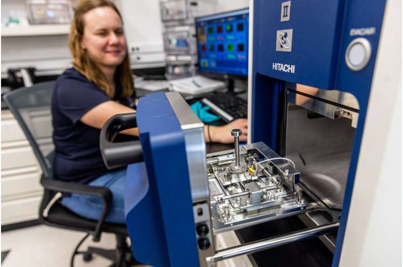 Jessica Barnes working in the Kuiper-Arizona Laboratory for Astromaterials Analysis at the University of Arizona. Credit: Chris Richards, University of Arizona Asteroid Bennu is a time capsule of materials bearing witness to its origin and transformation over billions of years