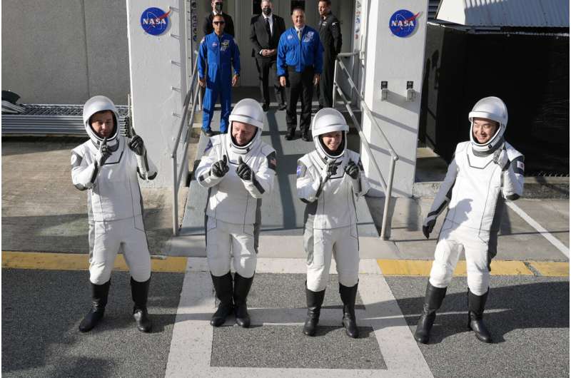 Astronauts, from left, Oleg Platonov, of Russia, Mike Fincke, Zena Cardman, and Kimiya Yui, of Japan, pose for a photo as they leave the Operations and Checkout Building for a trip the Kennedy Space Center's Launch Pad 39-A and a planned liftoff on a SpaceX Falcon 9 rocket Friday, Aug. 1, 2025, in Cape Canaveral , Fla. Credit: AP Photo/John Raoux Astronauts launch to the space station after sidelined by Boeing's troubled Starliner