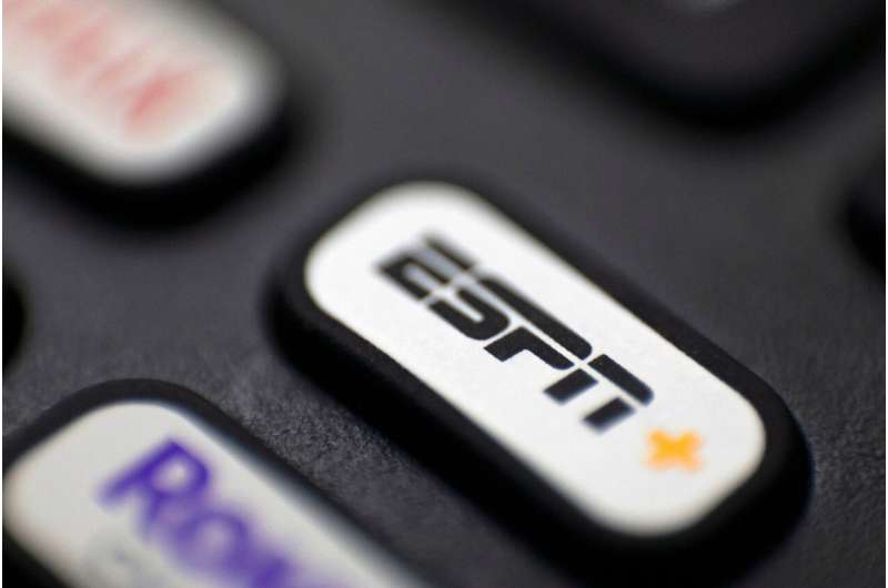 This Aug. 13, 2020 file photo shows a logo for ESPN on a remote control, in Portland, Ore. Credit: AP Photo/Jenny Kane, FIle Disney content has gone dark on YouTube TV. Here's what customers should know