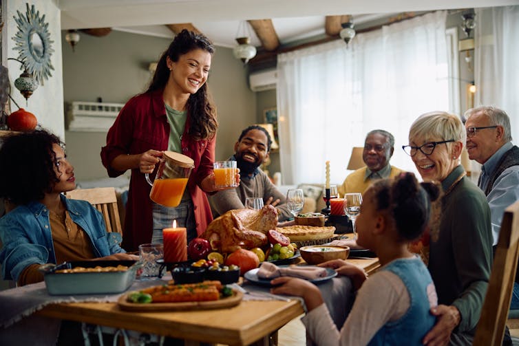 Family enjoying Thanksgiving meal