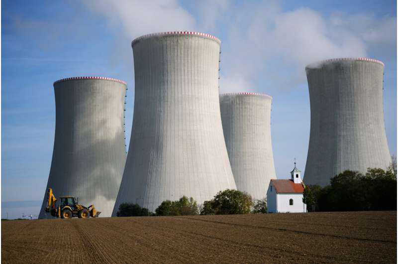 Cooling towers of the Dukovany nuclear power plant are seen in Dukovany, Czech Republic, Oct. 21, 2025. Credit: AP Photo/Petr David Josek Czech Republic plans $19 billion nuclear expansion to double output and end fossil fuel reliance